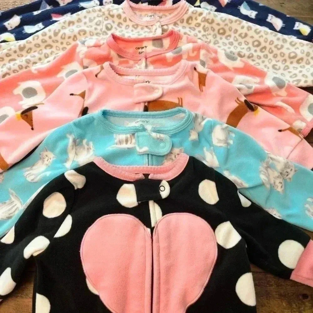 Six Carter’s Fleece Footie Pajamas